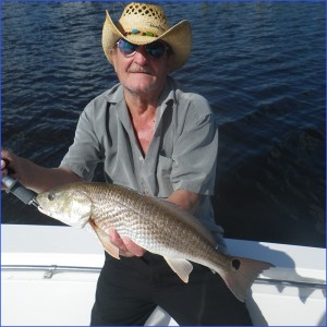 Bodo Massur from Germany handles this keeper redfish.